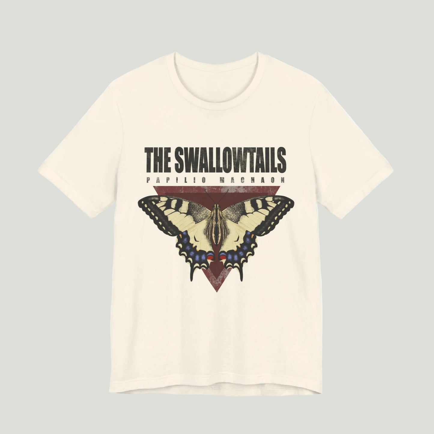 Beige t-shirt with butterfly graphic and 'The Swallowtails' text on a white background