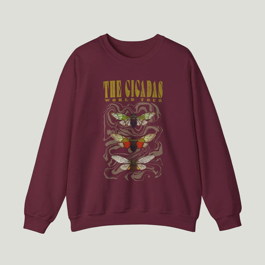 Maroon sweatshirt with cicada design and text on a white background