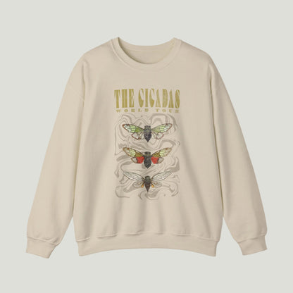 Beige sweatshirt with a cicada graphic and text on a white background