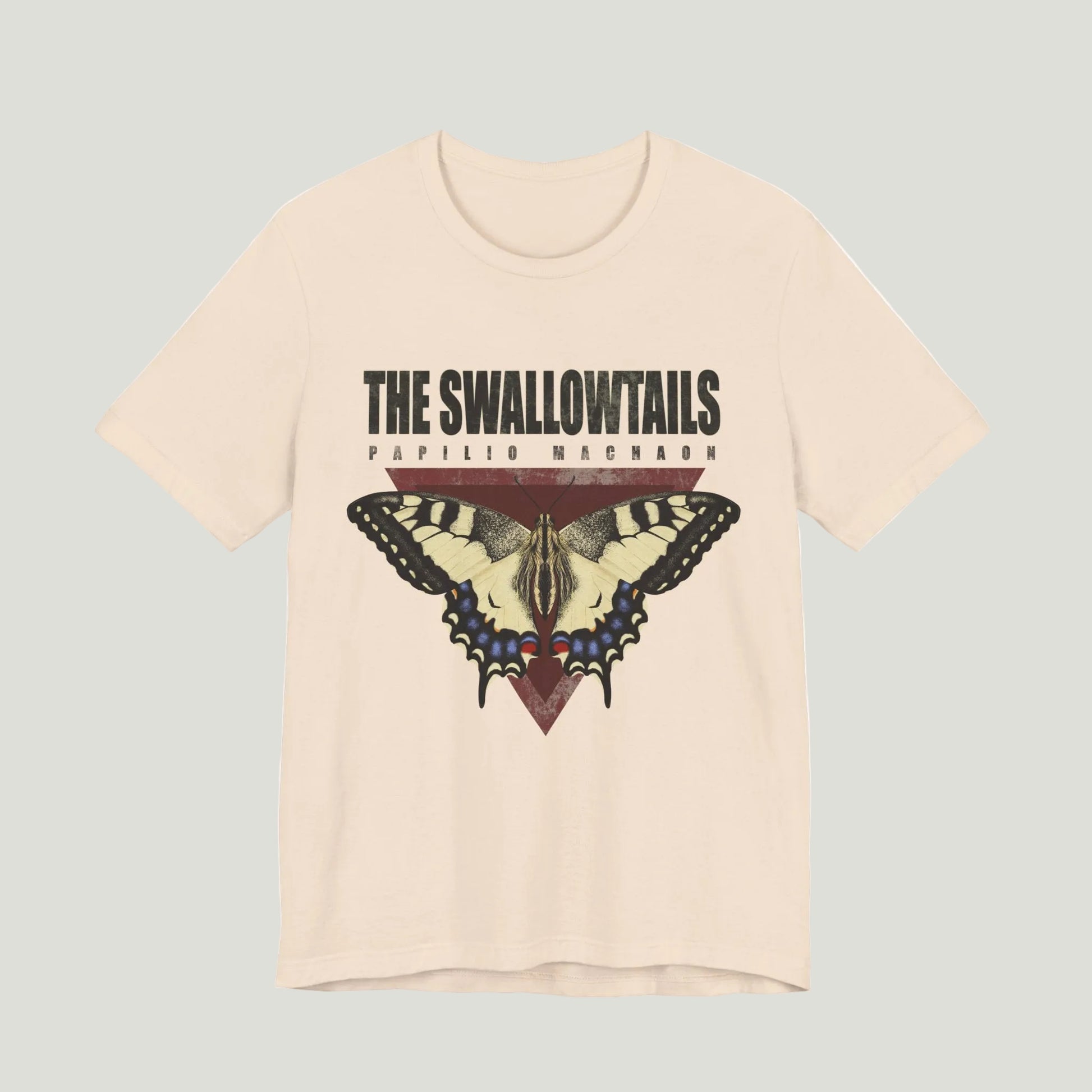 Beige t-shirt with butterfly graphic and text 'The Swallowtails' on a white background